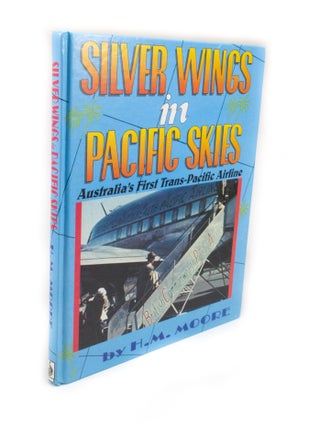 Item #2556 Silver Wings in Pacific Skies Australia's First Tans-Pacific Airline. H. M. MOORE