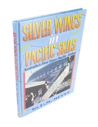 Item #4227 Silver Wings in Pacific Skies Australia's First Tans-Pacific Airline. H. M. MOORE